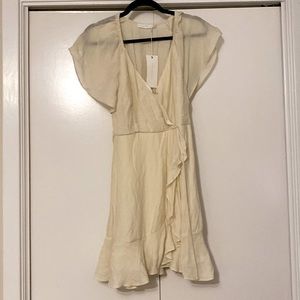 Lush cream ivory ruffle flowey side tie mini dress